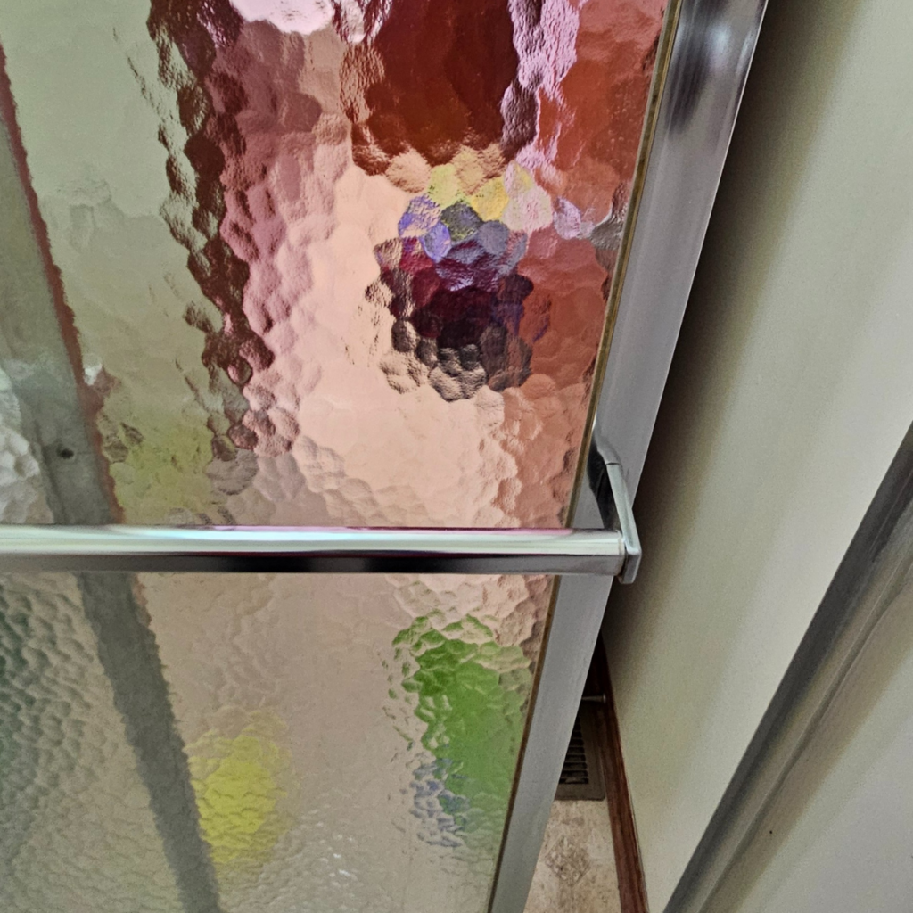 clean shower glass door after hard water removal Omaha NE streak free bathroom cleaning Triple J Cleaning Omaha