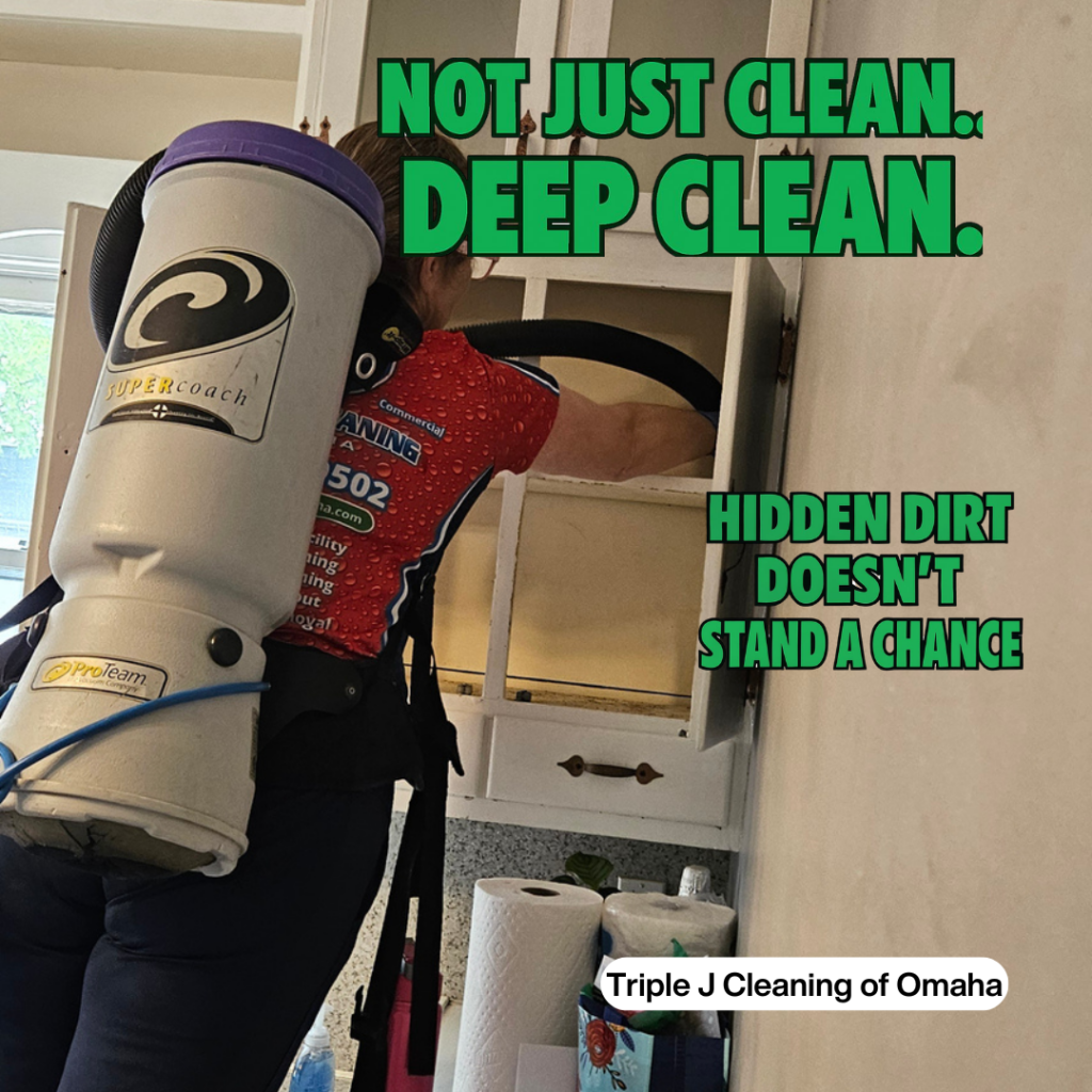House cleaning services Omaha NE professional cleaner removing hidden dirt from kitchen cabinets during a deep cleaning service